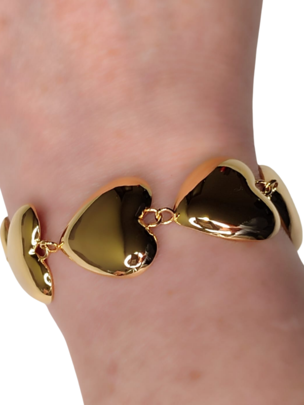 Pulsera corazones dorados