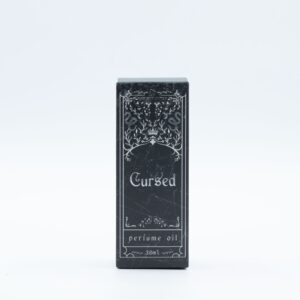 Frasco negro mate de aceite de perfume Maldito de 30 ml con cuentagotas junto a su caja negra ilustrada