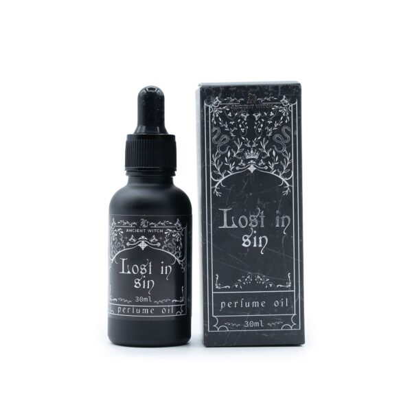 Frasco negro mate de aceite de perfume Perdido en el pecado de 30 ml con cuentagotas junto a su caja
