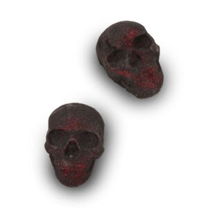 Bomba de baño con forma de calavera negra salpicada de brillo rojo