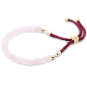Pulsera de cuentas de cuarzo rosa con cordón burdeos y pasador deslizante en tono dorado