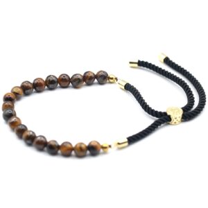 Pulsera de cuentas de ojo de tigre con cordón negro trenzado y pasador deslizante en tono dorado