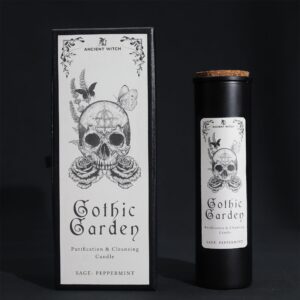 Vela ritual Jardín gótico en vaso negro junto a su caja ilustrada con una calavera entre rosas