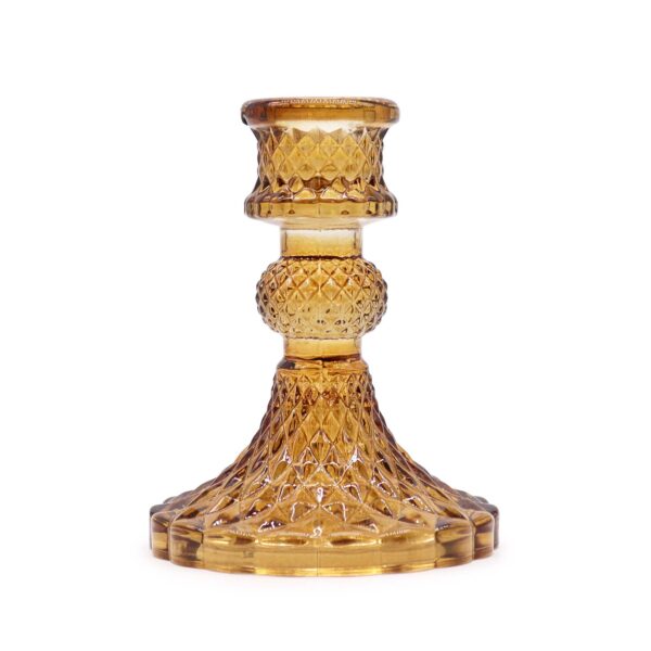 Portavelas de estilo vintage en vidrio prensado color ámbar con relieve de rombos, nudo en el tallo y pie ondulado