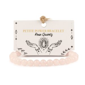 Pulsera elástica fina de cuentas de cuarzo rosa de 6 mm colgando de su tarjeta ilustrada