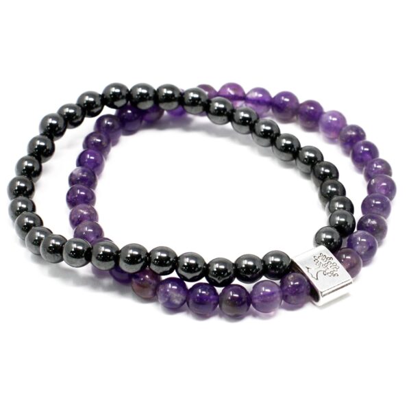Pulsera doble de cuentas de amatista y de hematita magnética unidas por un tubo con un árbol de la vida
