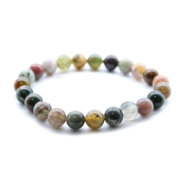 Pulsera elástica de cuentas de ágata musgo en verdes, rosados, grises y miel sobre fondo blanco