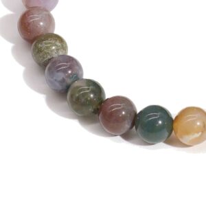 Pulsera elástica de cuentas de ágata musgo en verdes, rosados, grises y miel sobre fondo blanco