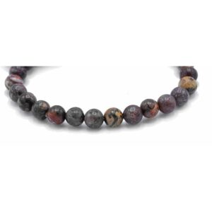 Pulsera elástica de cuentas redondas de jaspe piel de leopardo en gris, granate y ocre sobre fondo blanco