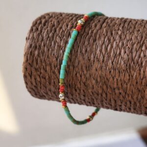 Pulsera de tubitos color turquesa verdoso con vetas finas