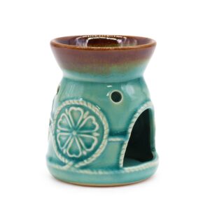 Quemador de aceite de cerámica turquesa craquelada con cazoleta marrón y medallón de flor en relieve
