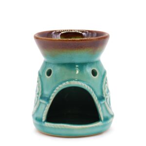 Quemador de aceite de cerámica turquesa craquelada con cazoleta marrón y medallón de flor en relieve