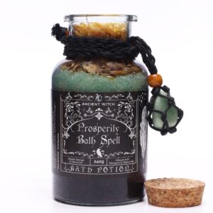 Amuleto de aventurina verde en red de cordón negro con cuenta de madera, atado a un frasco de sales de baño verdes