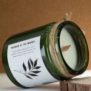 Vela de soja Leaves & Linen en tarro de vidrio verde con tapón de corcho y cordel al cuello
